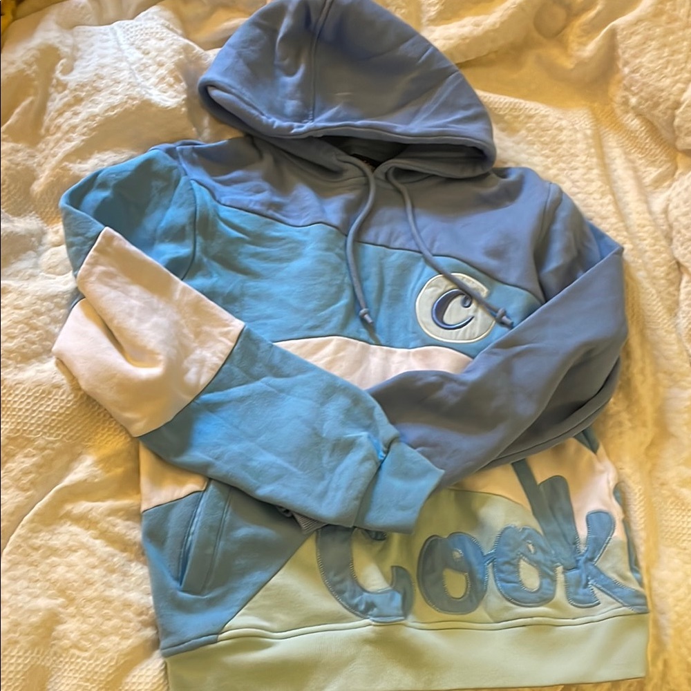 Light Blue and White Hooded Performance Jacket with Graphic Design